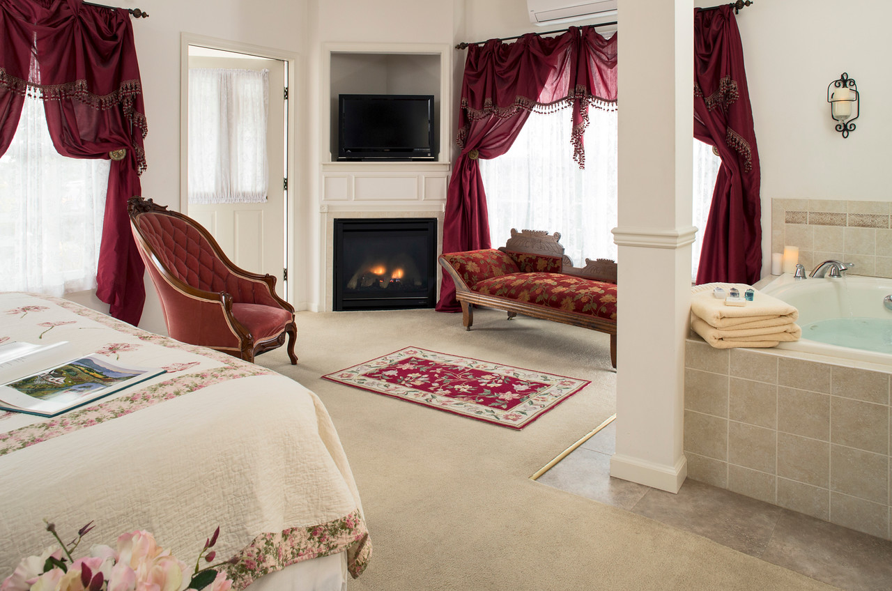 King bed near private entrance and fireplace