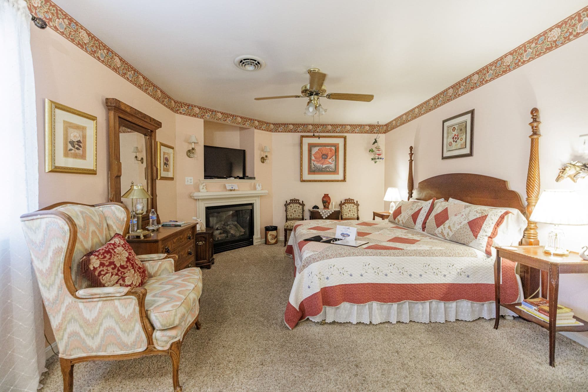 Cozy fireplace in a romantic guest room with warm, intimate atmosphere