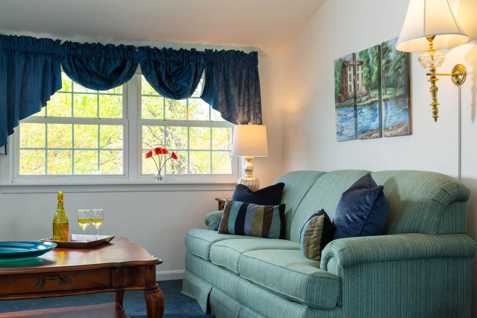 Sofa bed and table near window