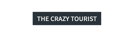 Text logo reading "THE CRAZY TOURIST."