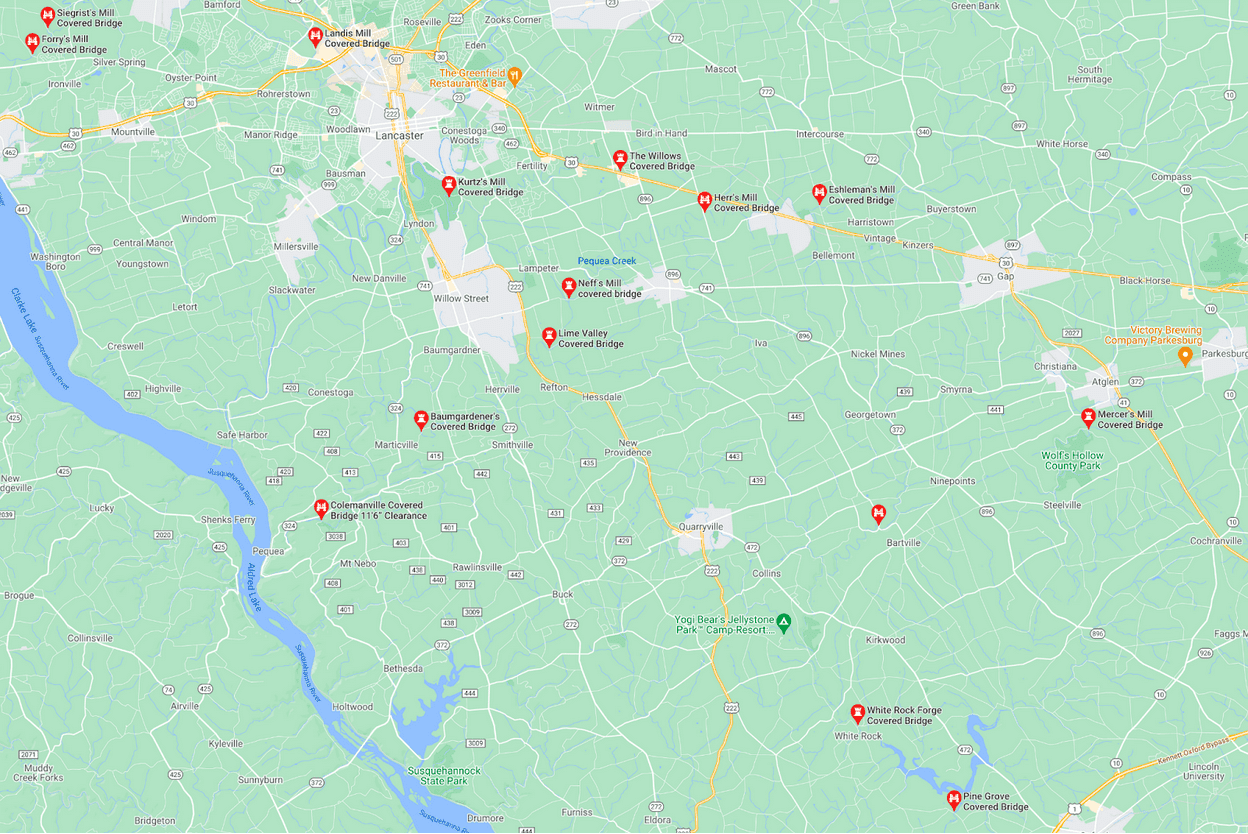 Map displaying various locations and attractions in a rural area, marked with red icons.