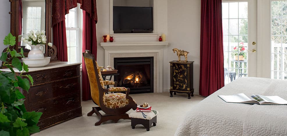 Dresser and chair near to fireplace