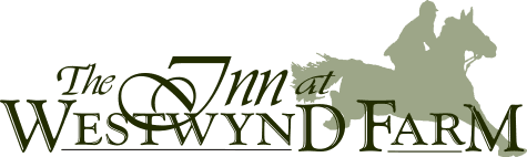 Logo of "The Inn at Westwynd Farm" featuring a horse rider silhouette.