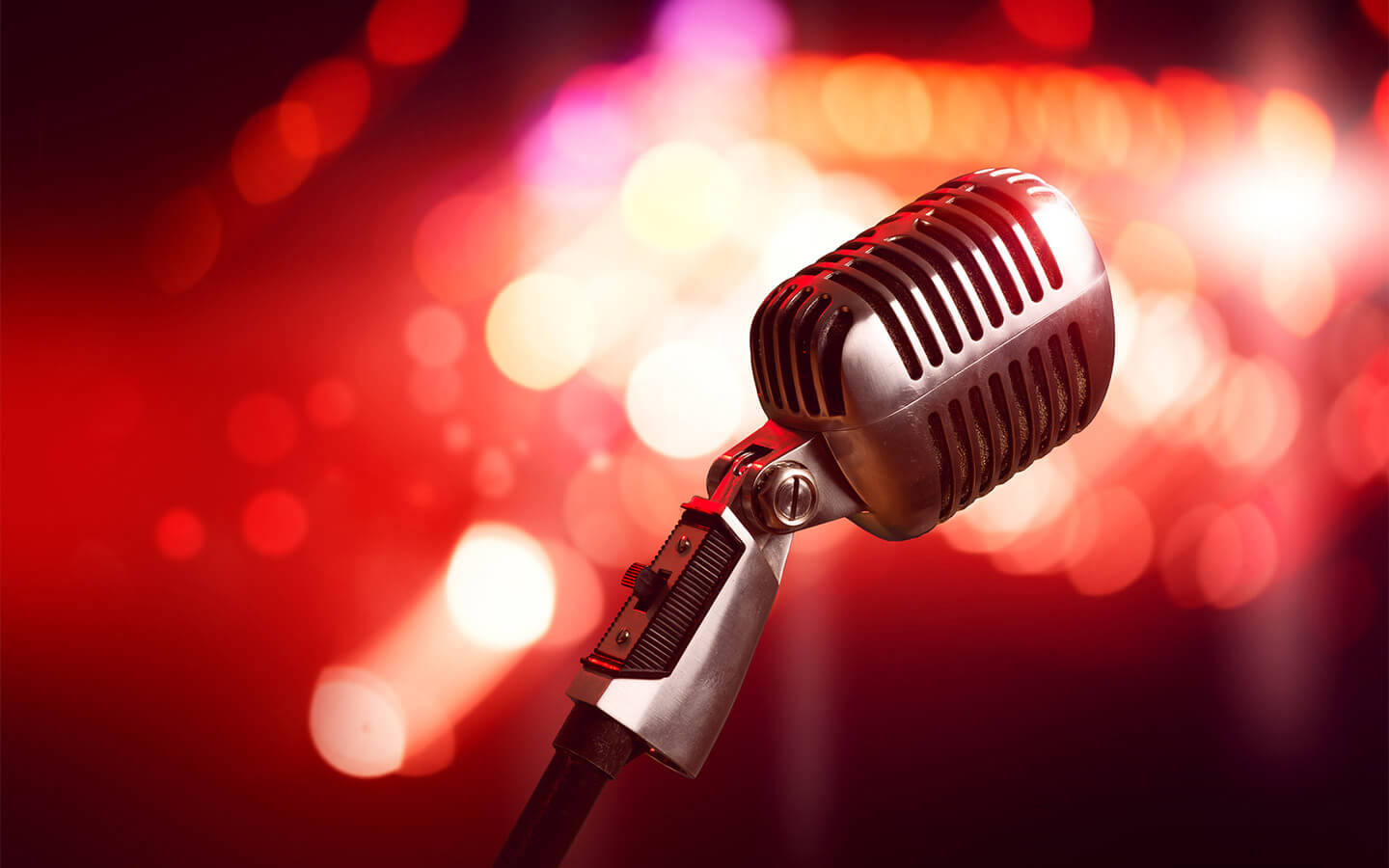 Mic in front of blurred lights